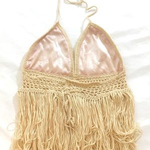 Crochet fringe triangle halter top.
